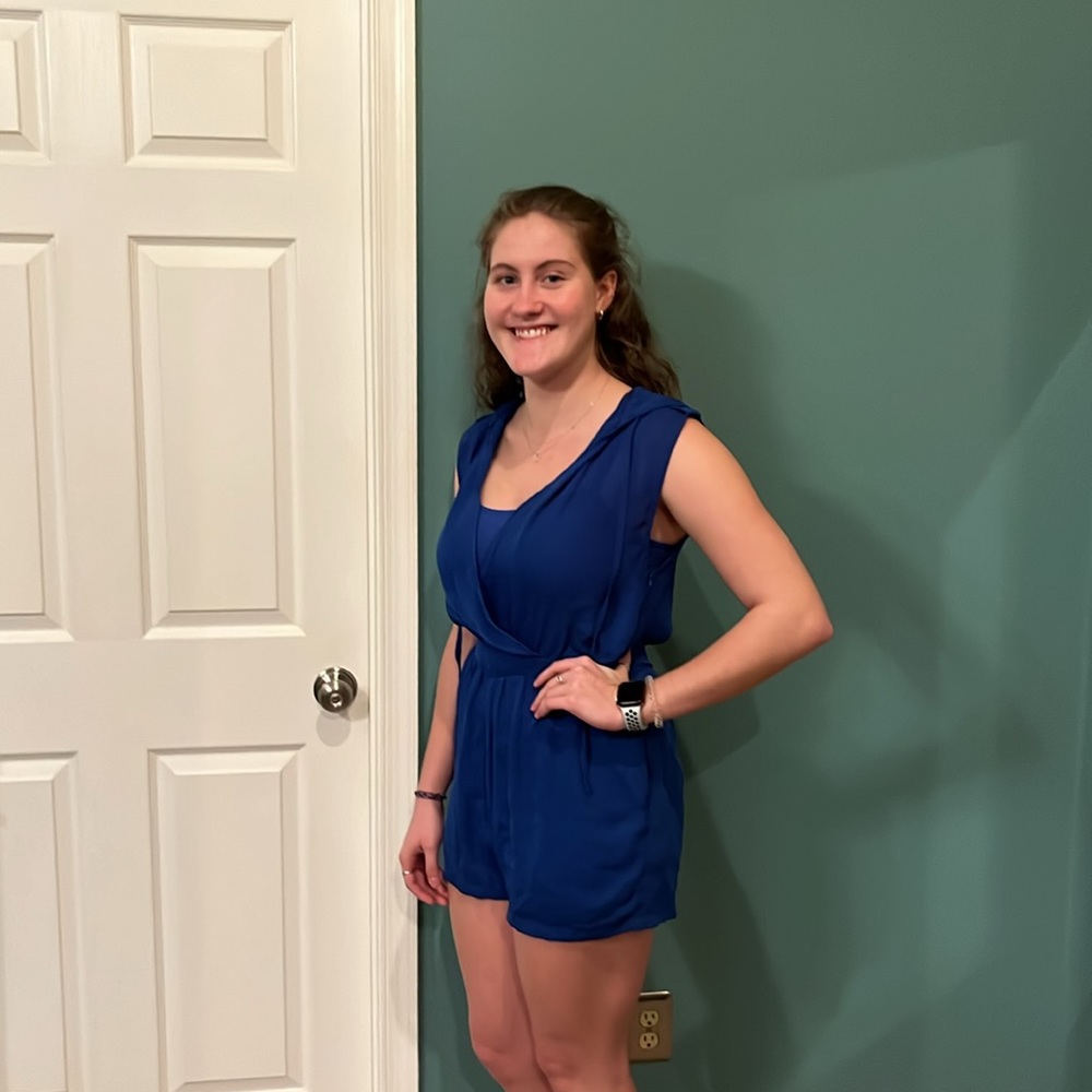 Blue hooded romper.